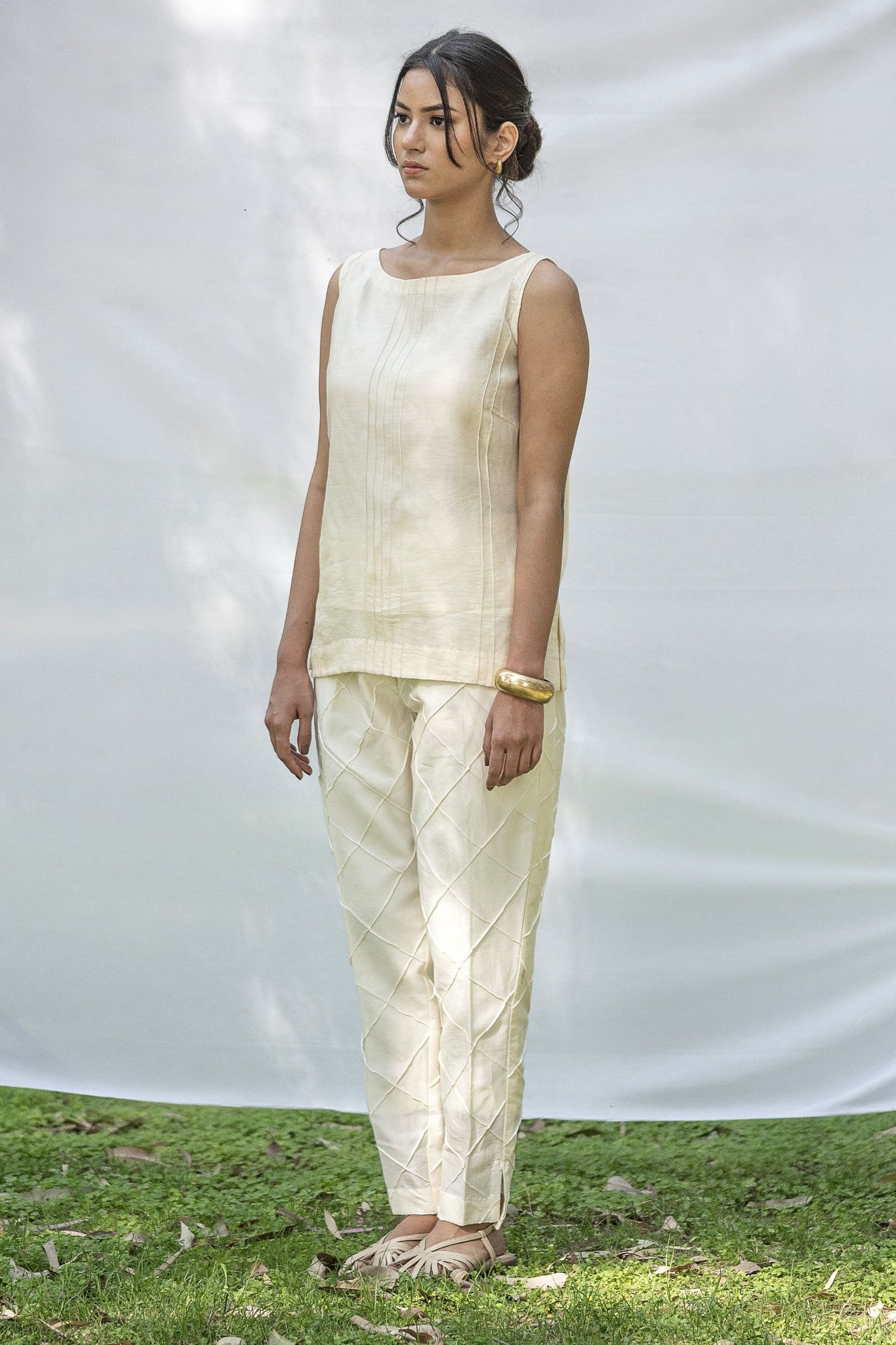 Off White Sleeveless Chanderi Silk Top with Centre Pin Tucks