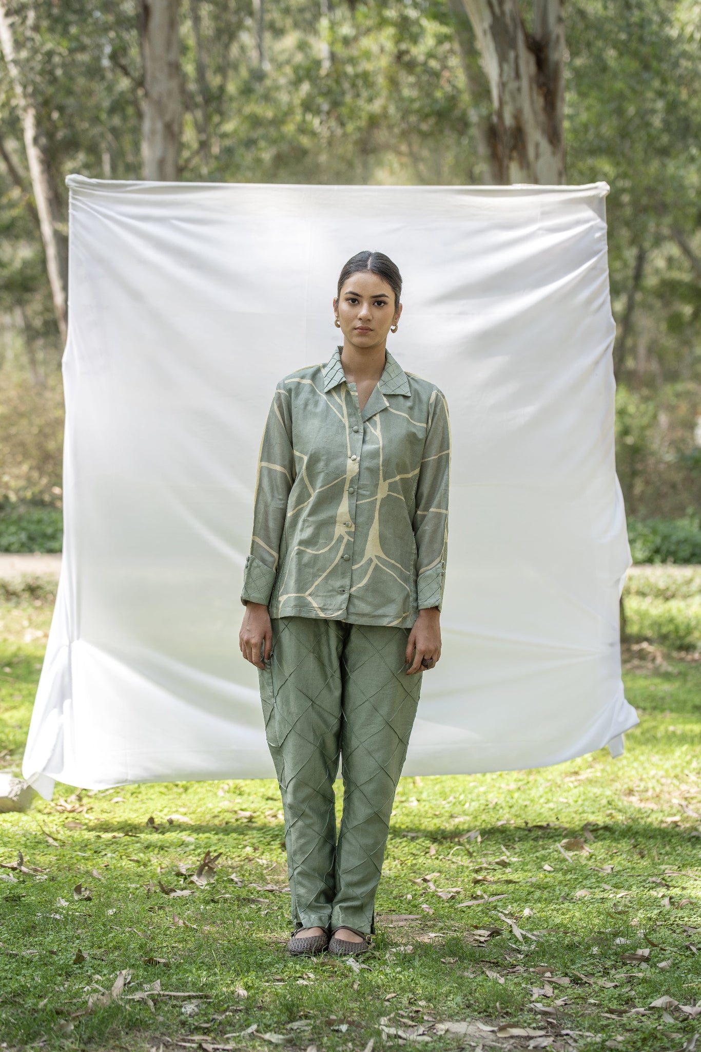 Olive Green Chanderi Silk co-ord set with yellow kintsugi print
Luxury shirt and trouser set with Kantha embroidery
Designer Chanderi Silk outfit with diamond pin tuck detailing
Elegant olive green occasion wear by Riiti
Handcrafted Chanderi Silk co-ord set with side pocket trousers