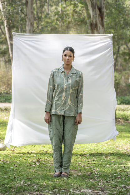 Olive Green Chanderi Silk co-ord set with yellow kintsugi print
Luxury shirt and trouser set with Kantha embroidery
Designer Chanderi Silk outfit with diamond pin tuck detailing
Elegant olive green occasion wear by Riiti
Handcrafted Chanderi Silk co-ord set with side pocket trousers