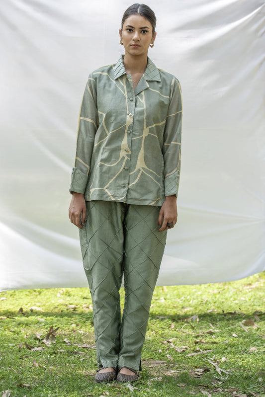 Olive Green Chanderi Silk co-ord set with yellow kintsugi print
Luxury shirt and trouser set with Kantha embroidery
Designer Chanderi Silk outfit with diamond pin tuck detailing
Elegant olive green occasion wear by Riiti
Handcrafted Chanderi Silk co-ord set with side pocket trousers
