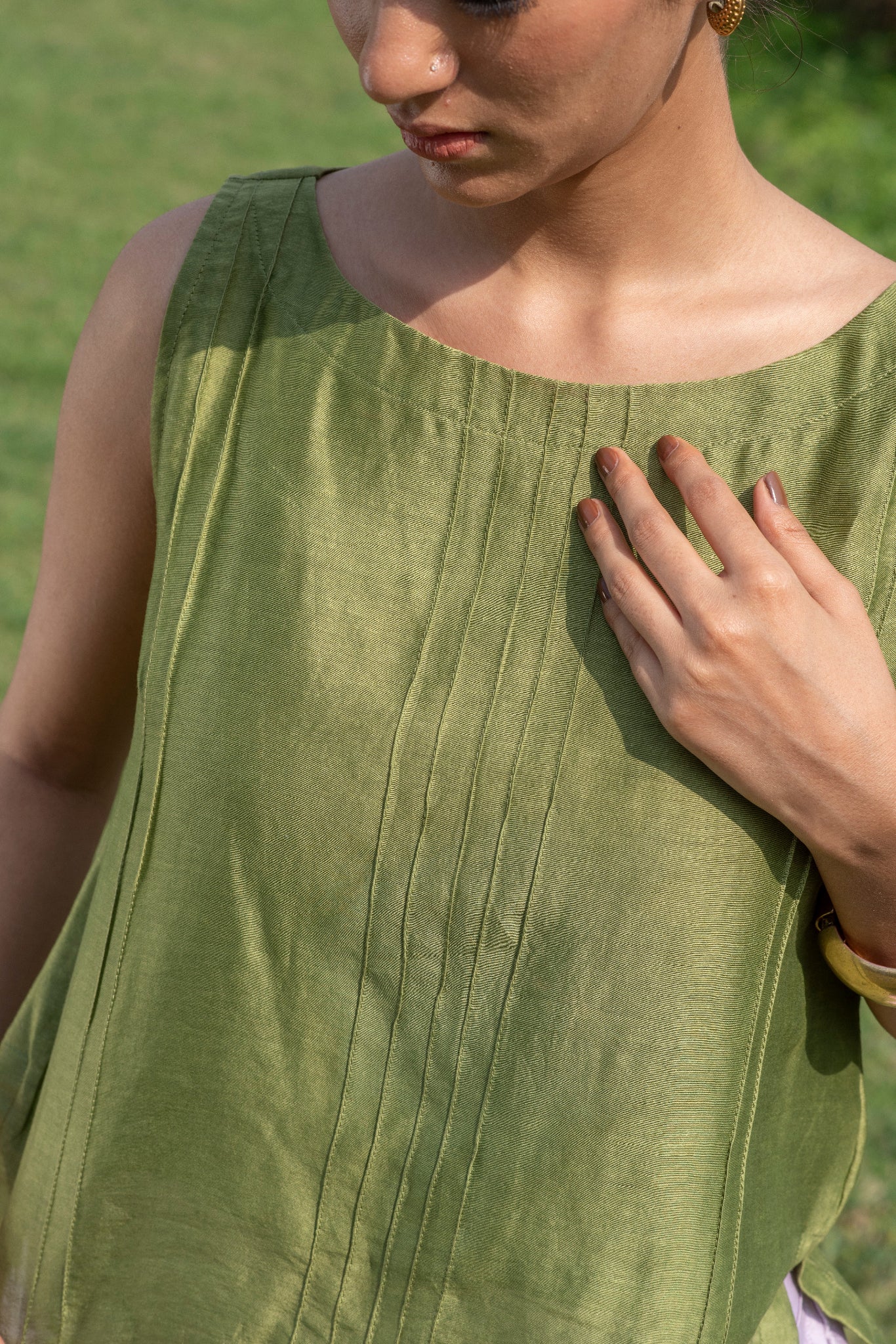 Contemporary sleeveless Chanderi top with pin tuck detailing